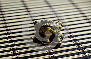Chinese toad on bamboo mat