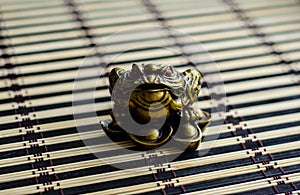 Chinese toad on bamboo mat