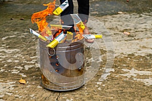 A Chinese tradition for praying ancestors, burning Joss paper.