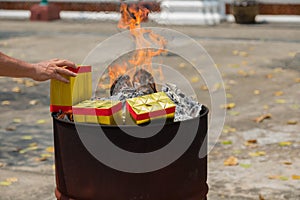 A Chinese tradition for praying ancestors, burning Joss paper.