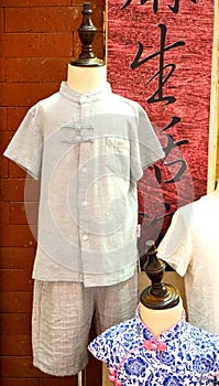 Chinese traditional linen clothes and qipao of childern