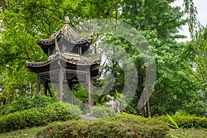 Chinese traditional pavilion on a hill in a park