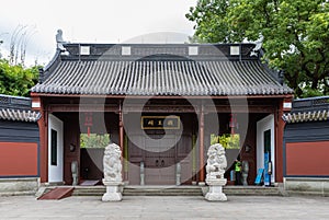 Chinese traditional style entrance gate to reconstructed King Qian Temple by West Lake