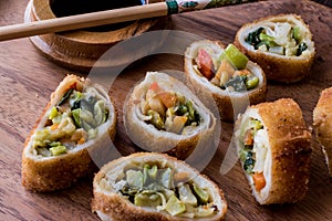 Chinese Vegetable Egg Rolls / Borek with soy soya sauce and chopsticks
