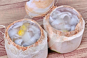 Chinese vegetable festival as coconut roll and ginkgo in coconut jelly served in coconut, 