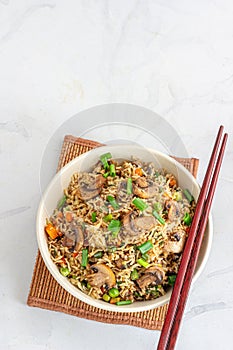 Chinese Vegetable and Mushroom Fried Rice with Sesame Seeds and Scallion Top Down Asian Food Photo