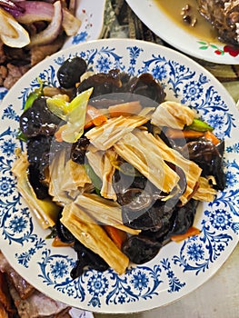 Chinese veggie salad with tofu skin and wood ear fungus close up