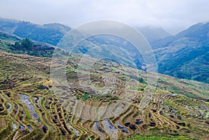 Chinese village and rice terraces, Guilin, Guangxi, China.