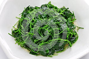 Chinese white wine stir fried with toothed bur clover photo