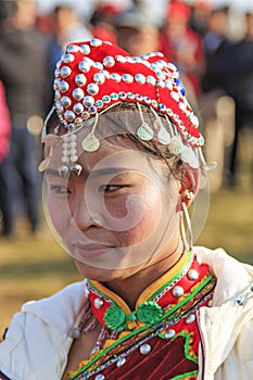 Chinese woman in ancient Chinese clothing during the Heqing Qifeng Pear Flower festival