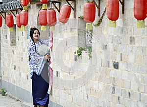 Chinese woman in Hanfu dress enjoy free time