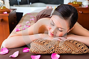 Chinese Woman having wellness massage