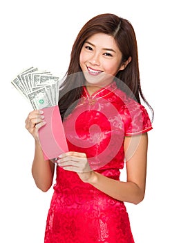 Chinese woman hold red pocket money with USD