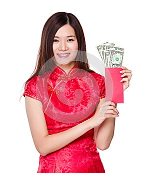 Chinese woman hold red pocket with USD