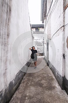 Chinese woman narrow alleys shaoxing china