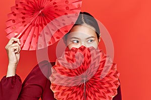 Chinese woman with paper fans