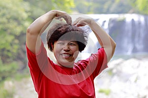Chinese woman at shuhaipubu waterfall, adobe rgb
