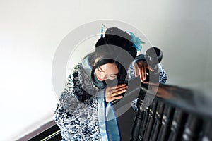 Chinese woman in traditional Blue and white Hanfu dress Stand on the stairs