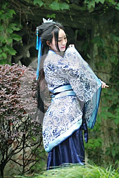 Chinese woman in traditional Blue and white porcelain style Hanfu dress