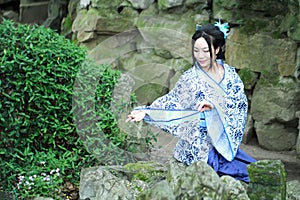 Chinese woman in traditional Blue and white porcelain style Hanfu dress