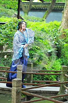 Chinese woman in traditional Blue and white porcelain style Hanfu dress