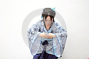 Chinese woman in traditional Blue and white porcelain style Hanfu dress