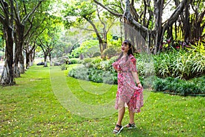 A Chinese woman in the tropical rainforest