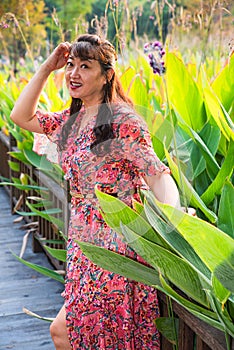 A Chinese woman in the tropical rainforest