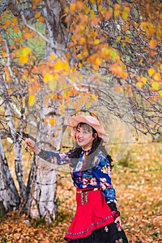 Chinese Women Traveling on the Autumn Grassland