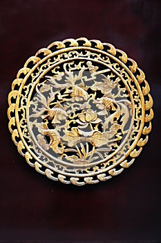 Chinese woodcarving:fish and lotus photo