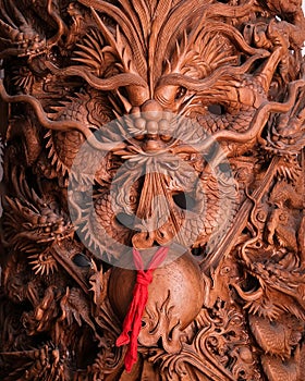 Chinese wooden statue of a dragon, hand-carved