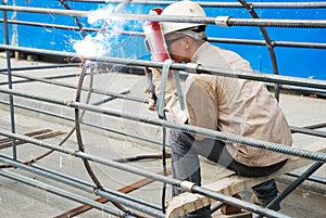 Chinese worker welding steel