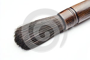 The Chinese writing brush is isolated on a white background