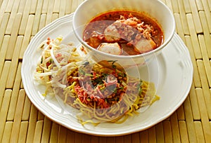 Chinese yellow noodle and spicy pork ball with dried shrimp soup