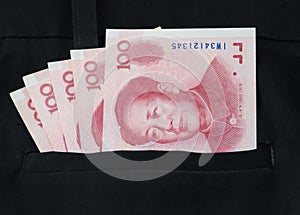 Chinese yuan banknote in the trousers pocket