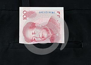 Chinese yuan banknote in the trousers pocket