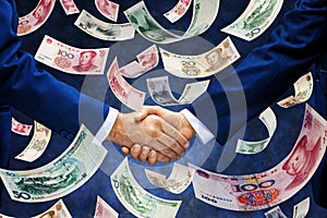 Chinese Yuan Money Handshake Business China