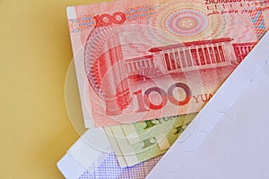 Chinese Yuan renminbi notes in an envelope