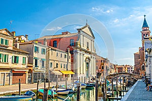 Chioggia cityscape with narrow water canal