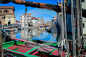 Chioggia, town in venetian lagoon, water canal and boats