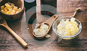 Chios mastic tears on wooden background, closeup view