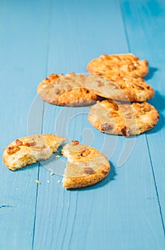 chip cookies on blue wooden table/ chip cookies on blue wooden table, selective focus