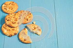 Chip cookies with nuts/chip cookies with nuts on a blue wooden b