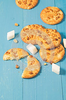 chip cookies with nuts and lump sugar/ chip cookies with nuts and lump sugar on a blue wooden background, top view