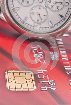 Chip of Credit cards and a watch up close