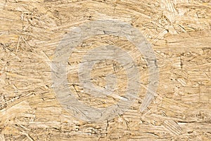 Chipboard wood background and alternative construction material