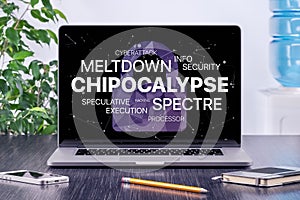 Chipocalypse concept with meltdown and spectre threat on laptop screen in office workspace photo