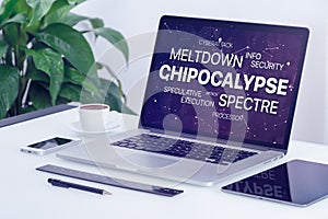 Chipocalypse concept with meltdown and spectre threat word cloud on laptop screen