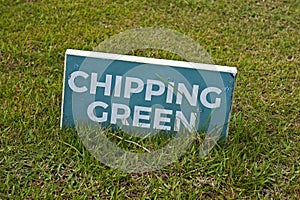 Chipping Green, text in a signboard over the grass on golf course, Rio photo