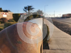 Chipping handrailing by side of road